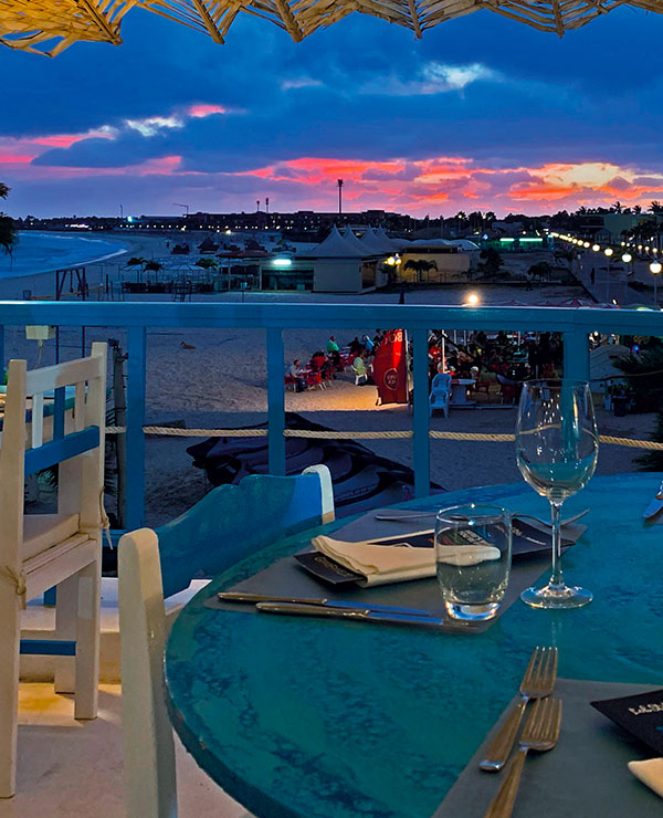 LobStar Enjoyable Seafood Restaurant Oyster Bar Santa Maria Pier Cape Verde by Night from Terrace