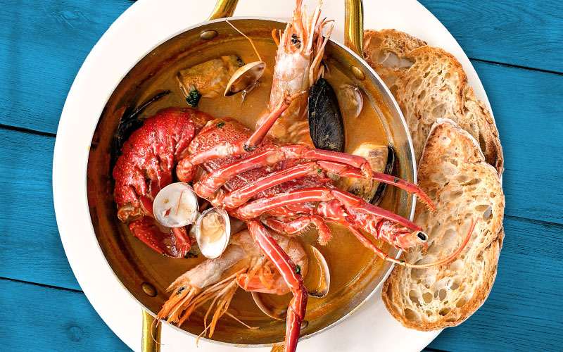 PalmBeach Tropical Restaurant | LobStar Cauldron | fish, spiny lobster and shellfish soup, with baked croutons