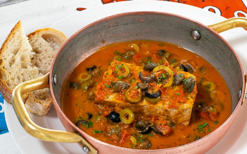 PalmBeach Tropical Restaurant | Sautéed Catch of the Day in Sauce | fish steak cooked in tomato sauté, capers and olives