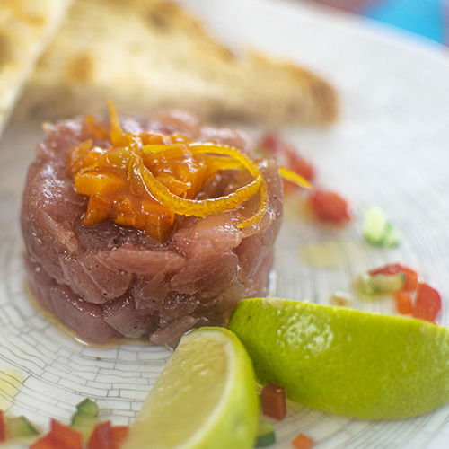 LobStar Enjoyable Seafood Restaurant | Tuna Tartare with Lime | cubes of flash frozen tuna served with lemon peel, black pepper, smoked salt, extra virgin olive oil